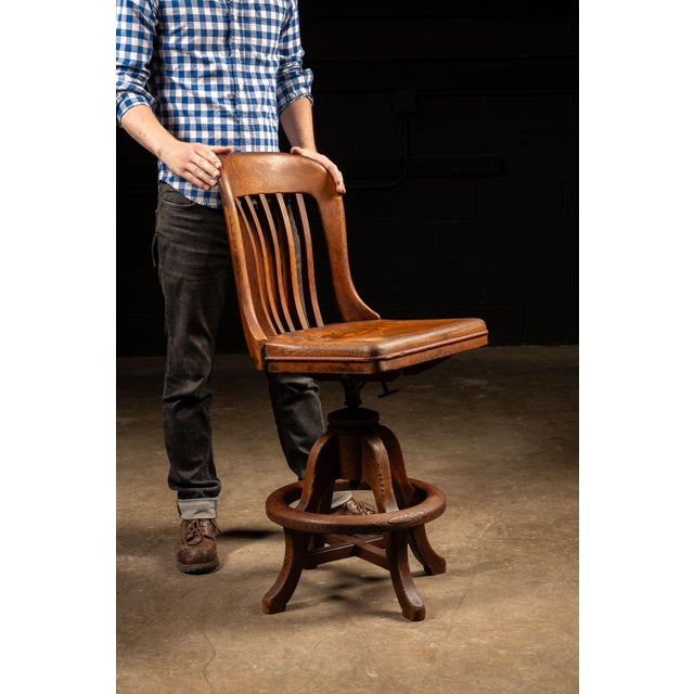 1930s adjustable swivel stool manufactured by Sikes Co., Inc. of Buffalo, New York, appearing to be model No. 031½....