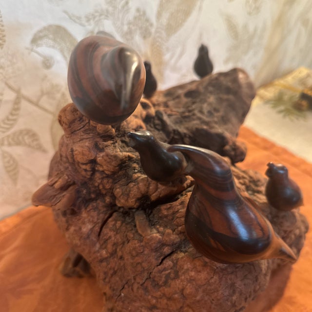 Gorgeous vintage 7 variegated wood carved quails on a large piece of burl wood. Wood has a variety of different shades and...