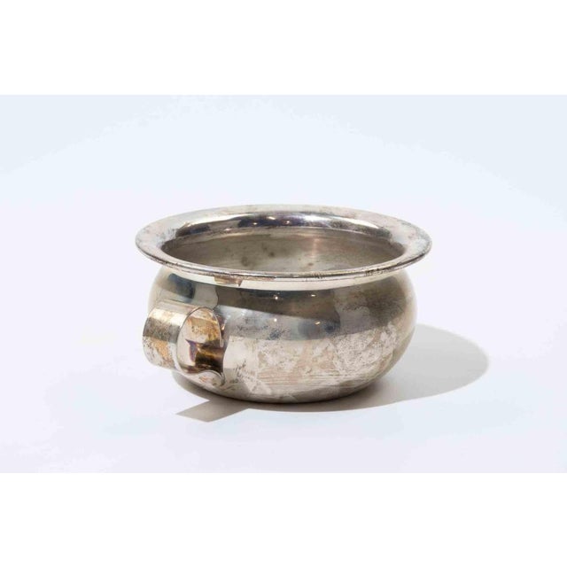 Unusual and sculptural silver-plated vessel produced by Fornari Roma, Italy, retaining the original maker’s label to the...