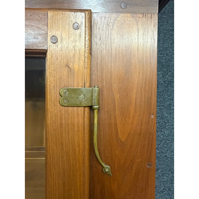 Handcrafted bench-made Dutch cupboard in the Chippendale tradition, beautifully executed in rich walnut with classic...