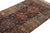 Hand-knotted in wool and originating from turkey circa 1950-1960, this 3x14 vintage runner rug features a design that...