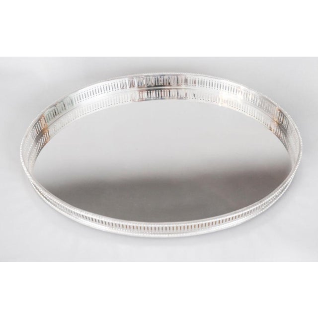 This is a large beautiful antique English Victorian Neo- Classical oval silver-plated gallery tray, circa 1920 in date....