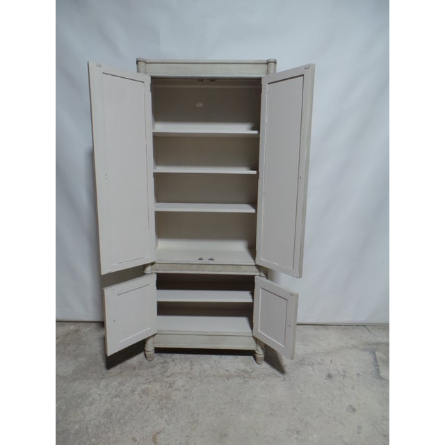 This is a unique Gustavian Style Wardrobe. it was restored and repainted with Milk Paints "Oyster White"
