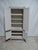 This is a unique Gustavian Style Wardrobe. it was restored and repainted with Milk Paints "Oyster White"