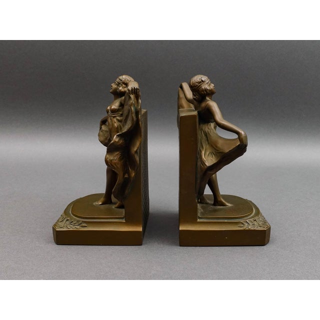 Loie Fuller Art Deco Nouveau Dancing Girl Flapper Spelt Bronze Pair Of Bookends Measures approximately 4 1/2" long, 3 7/8"...