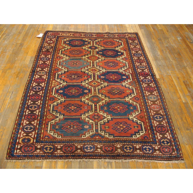 Antique Caucasian rug, measures: 5'0" x 7'0". Antique Caucasian Caucasian Blue 1900s Blue Rug, Circa Date: 1900s. This...
