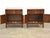 A pair of mid century modern walnut single drawer nightstands with two doors and polished brass knobs in the style of Paul...