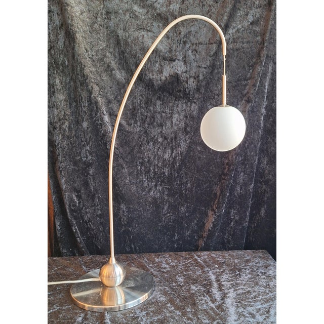 Vintage Table Lamp with Metal Frame and White Glass Globe by Schneider GMBH & Co, 2003, in Very Good conditions. Designed...