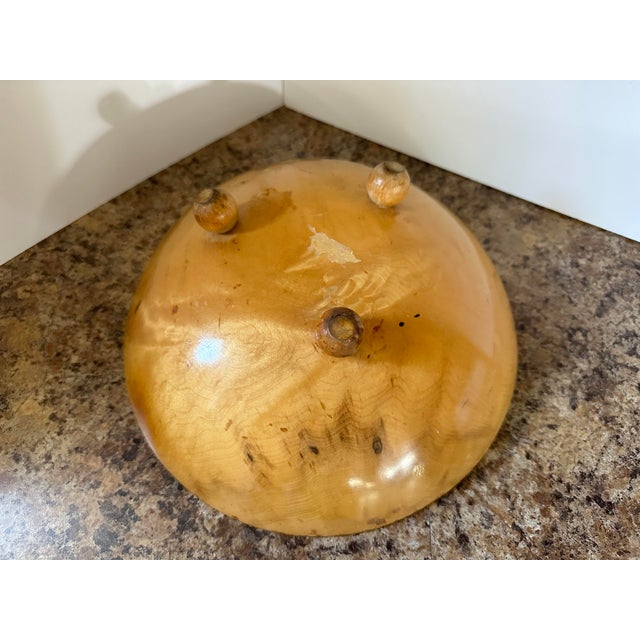 No markings but in the style of Munising bowls. Wonderful ivy painted on the inside of the bowl.