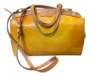 A 2002 Louis Vuitton Brea Monogram Yellow Vernis Patent Leather Shoulder Bag