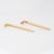 Fine detailed pair of gold bar barrel drop earrings crafted in 14k yellow gold (circa 1980s to 1990s). Each earring...