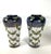 The pair of Royal Doulton stoneware vases by Bessie Newbury, a ceramic artist working at Royal Doulton. The shouldered...