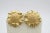 These are large 14k sunflower motif earrings. There is textured and bead detailing. Stamped 14k and sign JIL