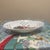 An elegant vintage porcelain decorative bowl or candy dish by Formalities by Baum Brothers, featuring the classic...