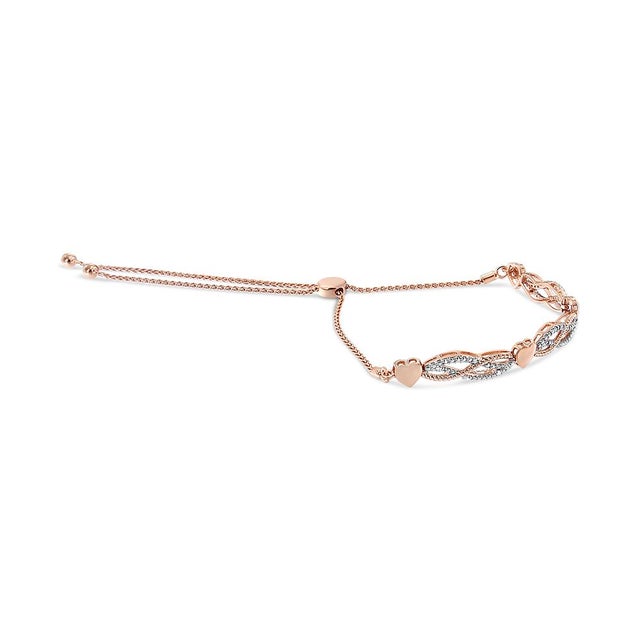 Certain to create a sophisticated look with any attire, this stylish diamond bolo bracelet is composed of 14k rose gold...
