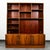 Danish modern two-piece shelving unit it Brazilian rosewood. An excellent media unit that offers ample shelving and a...