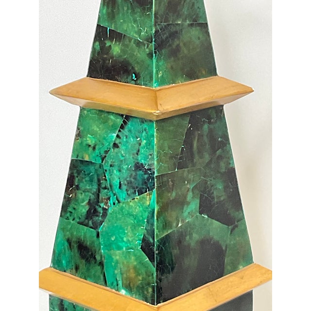 A four tiered wooden obelisk is painted with a green faux malachite. Gold base and gold painted dividers create visual...