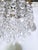 Metal Vintage Brass Embossed Crystal Chandelier With Cascading Swedish Cut Prisms For Sale - Image 7 of 8