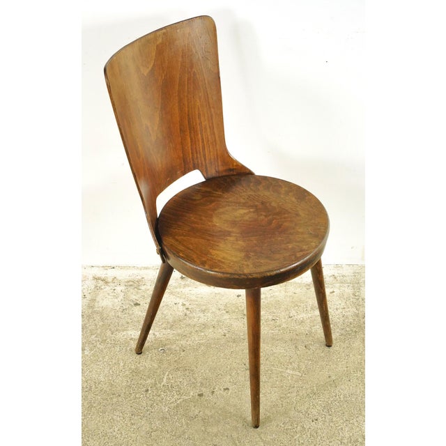 1960s Mid Century style dining chairs Attributed to Baumann, a French furniture company founded in 1901 by Swiss Emile...