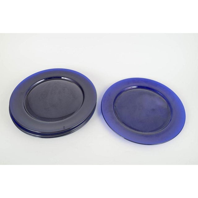 Scandinavian Art Glass Set Of 5 Charger Plates, 1980s. Set of five deep cobalt-blue charger plates in thick, transparent...