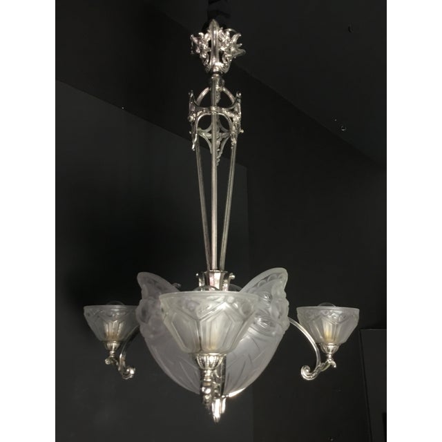 Rare and authentic French Art Deco chandelier crafted in nickel-plated bronze by renowned designer Pierre Gilles, Paris,...