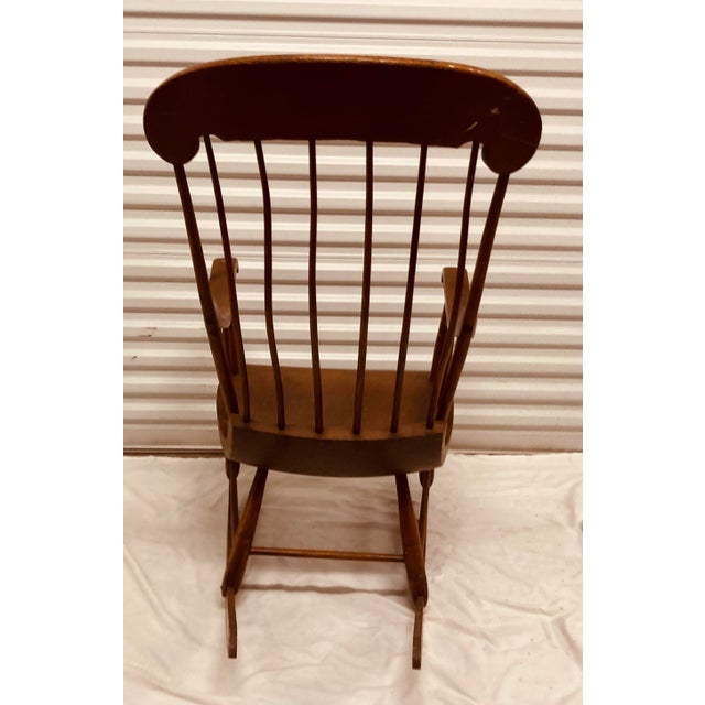 Beautifully made mahogany American Windsor rocking chair with spindle back & sides shaped crest rail back single board...