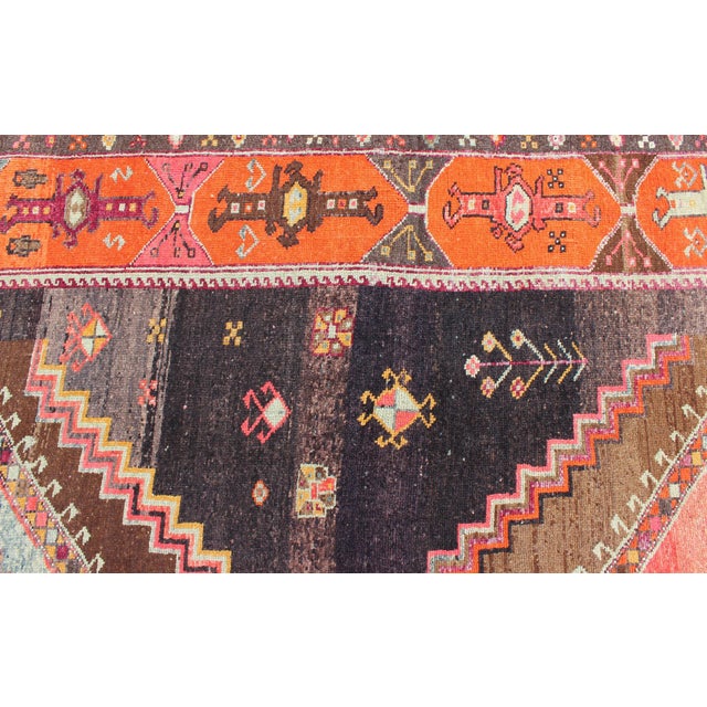 Measures: 6'8"X16'8" Vintage wide and long gallery runner from Turkey with geometric layered Medallion design in Brown...