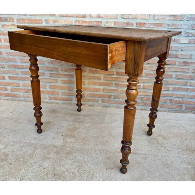 Charming Spanish work table crafted from solid wood, featuring a simple yet elegant traditional design. The table features...