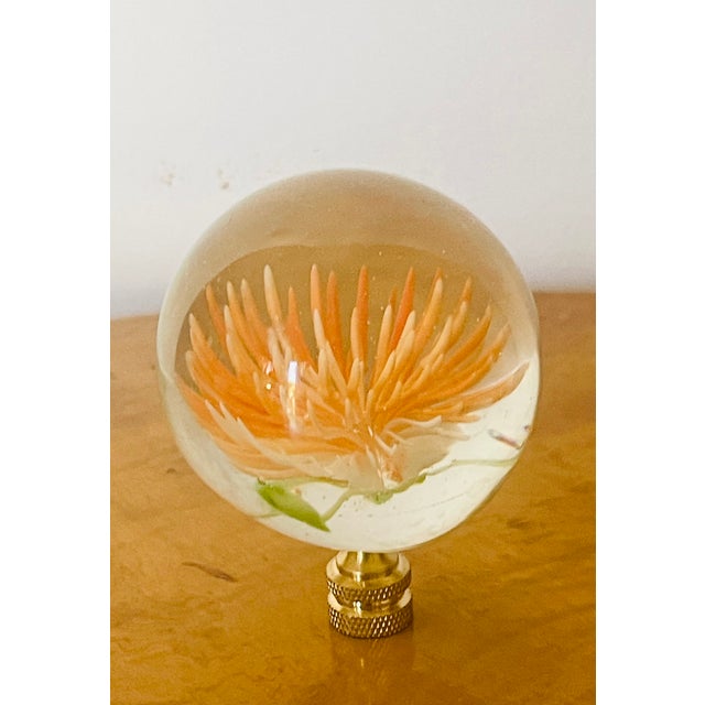 Beautiful glass flower paperweight on brass base as lamp finial.