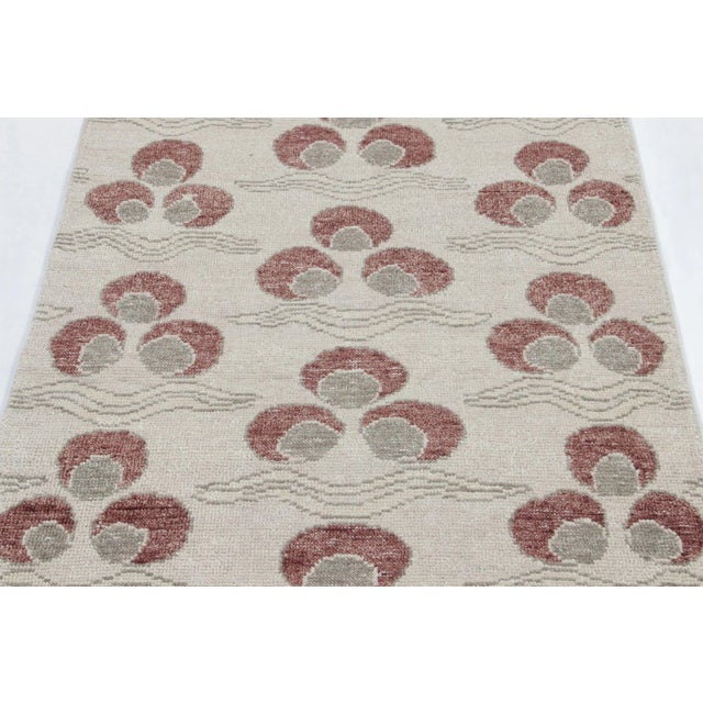 Hand-knotted in wool, this 3x8 runner rug is a masterful addition to Rug & Kilim’s Distressed Homage Collection. Inspired...