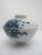 Small Japanese sometsuke style porcelain lidded rice or soup bowl. White with intricate blue flowering branches. Excellent...
