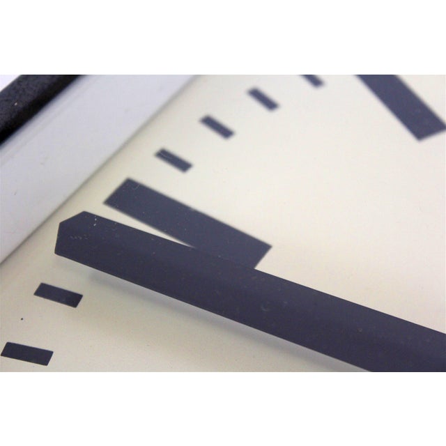 Square railway clock made by Pragotron in former Czechoslovakia. The clock mechanism has been replaced with a new one,...