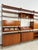 Beautiful vintage freestanding shelving system original form the 1960s made of black metal ladders and teak wood elements....