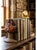 Charming antique Hubley cast-iron doorstop featuring a woven basket overflowing with colorful flowers and green foliage,...