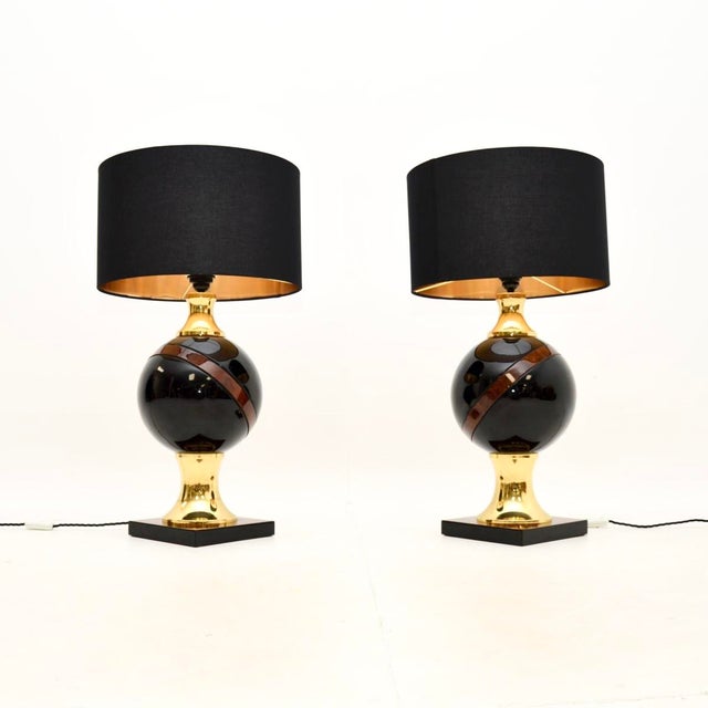 A very large and stylish pair of vintage Italian walnut and brass table lamps, dating from around the 1970’s. They are...