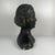 Neoclassical style plaster bust of a woman by M. Mongey, 20th century. Plaster with a bronze patina. Dimensions: 40 x 25...