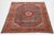 This Persian Kashan hand-knotted wool rug has a gray field and multicolor accents all over the motif. This rug measures...