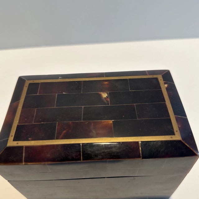 A lovely C. 1970s Maitland- Smith penshell box with brass inlay. I love the look of penshell it has a tortoise shell...