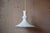 Refined and timeless, this beautiful Danish pendant light is the brainchild of the talented Michael Bang. Made of white...