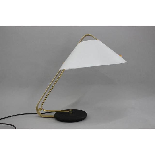 Made of iron and brass Lamp shade made of plastic. E26 or E27bulb. Up to 250V (Europe/UK Standard).The wiring of this item...