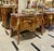 A true masterpiece of French-inspired luxury, this stunning Louis XV Bombe Commode showcases an elegant serpentine...
