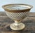 This exquisite vintage Regency-style pedestal bowl is a masterclass in delicate porcelain craftsmanship. The centerpiece...