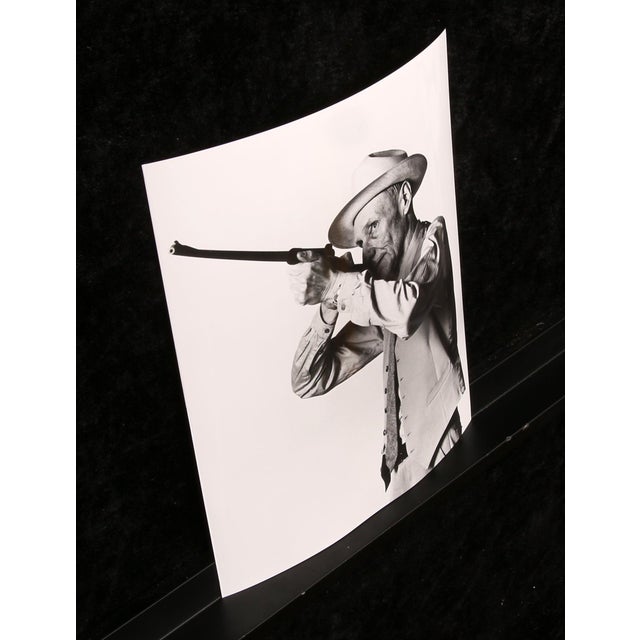 This print by the renowned photographer robert mapplethorpe features the iconic writer william s. Burroughs, a central...