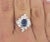 Natural 1.52 Carat Oval Blue Sapphire and Diamond Platinum Floral Ring For Sale In Miami - Image 6 of 9