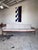 Newly upholstered mid century modern Danish teak sofa by Grete Jalk, featuring tapered legs, a refinished slatted back...