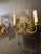 Circa 1930 French Louise XIV style bronze sunburst sconces with 2 lights