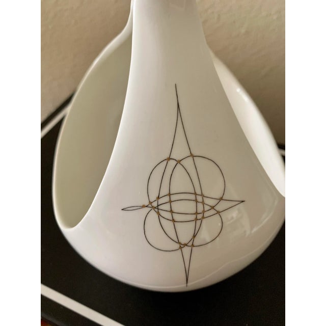 Fantasy—a pattern of black squiggles and gold dots conceived by Ross Littell, who along with William Katavolos and Douglas...