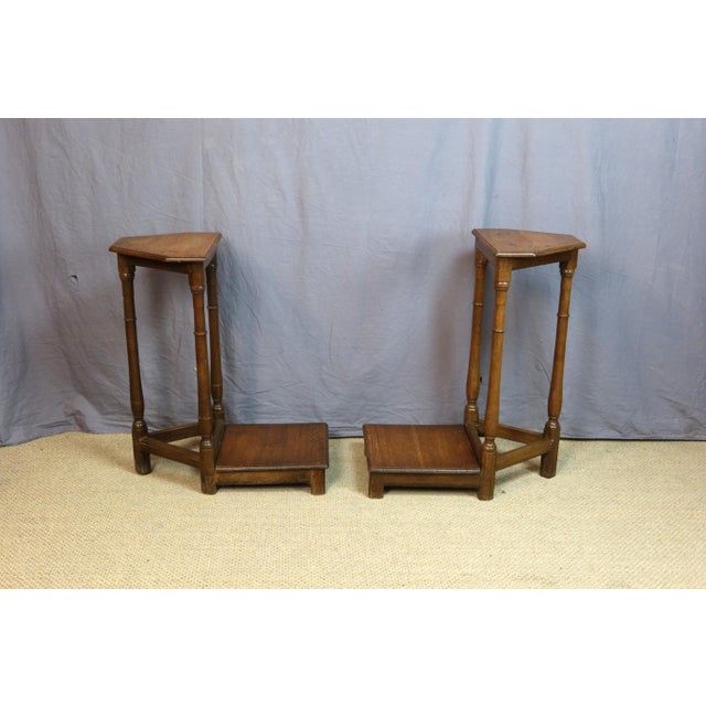 Pair of early 19th-century oak cantor's stools. They can be repurposed as side tables, bedside tables, or end tables....