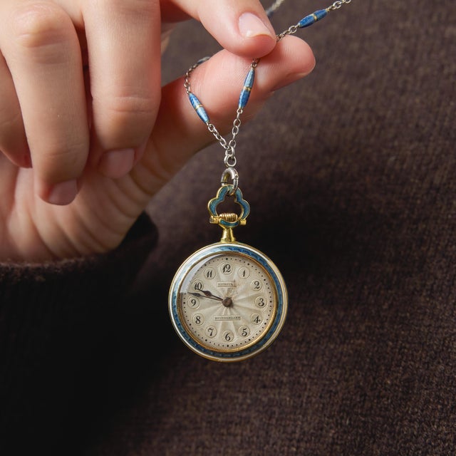 This exceptional Tiffany & Co. pocket watch pendant necklace embodies the refined elegance of the Edwardian era, featuring...