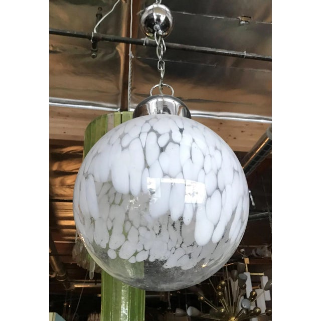 Italian murano glass globe pendant blown with milky white pattern on chrome hardware, by Venini circa 1960s
